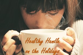 A woman holding a coffee cup with the words healthy handle on it.