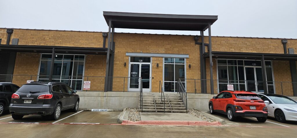 Front of Stoke Coworking building in Denton Texas where Love to Live Well office is located